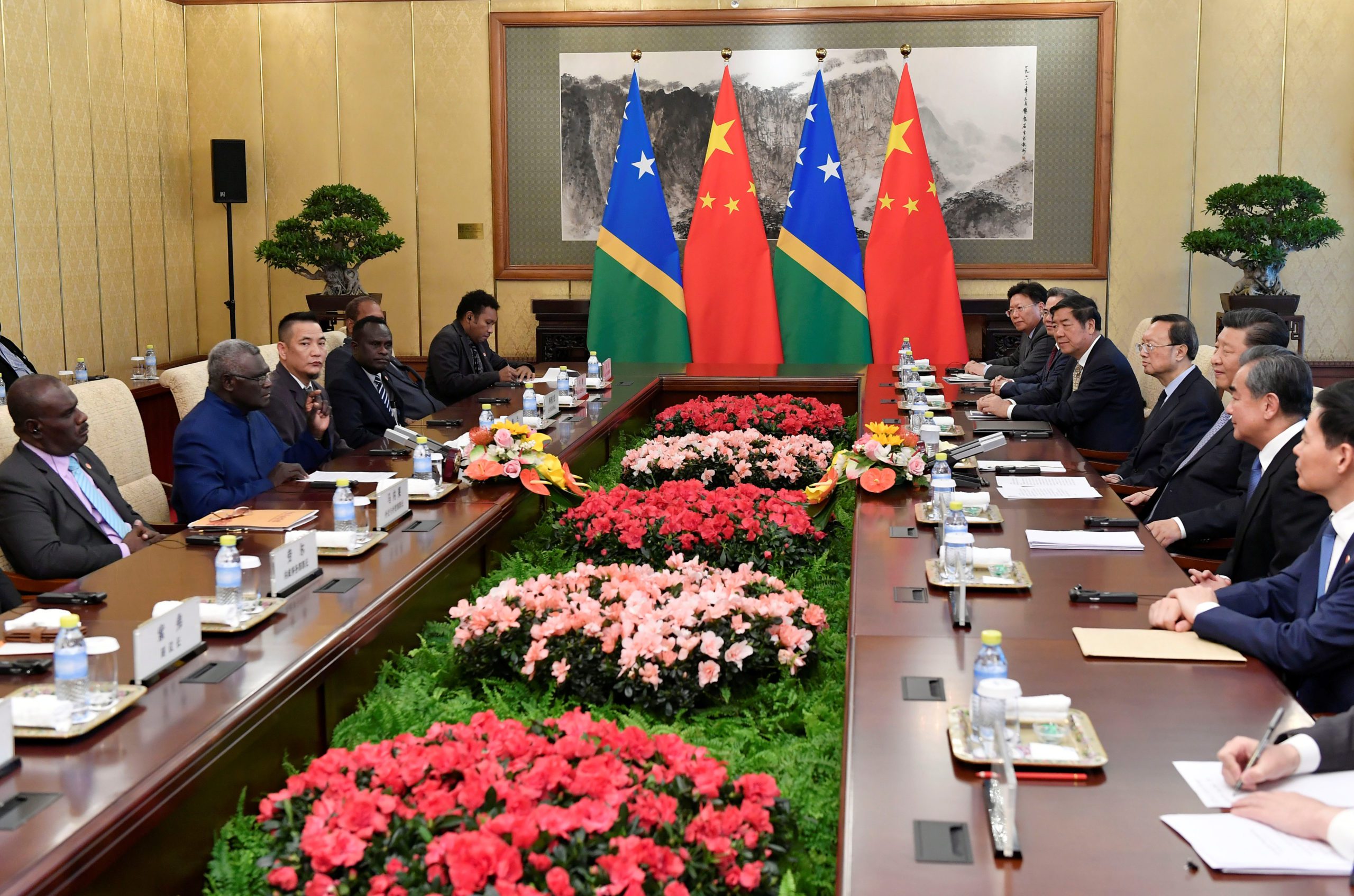 Solomon Islands Prime Minister Manasseh Sogavare talks to Chinese President Xi Jinping during their meeting at the Diaoyutai State Guesthouse in Beijing, China, October 9, 2019. Parker Song/Pool via REUTERS