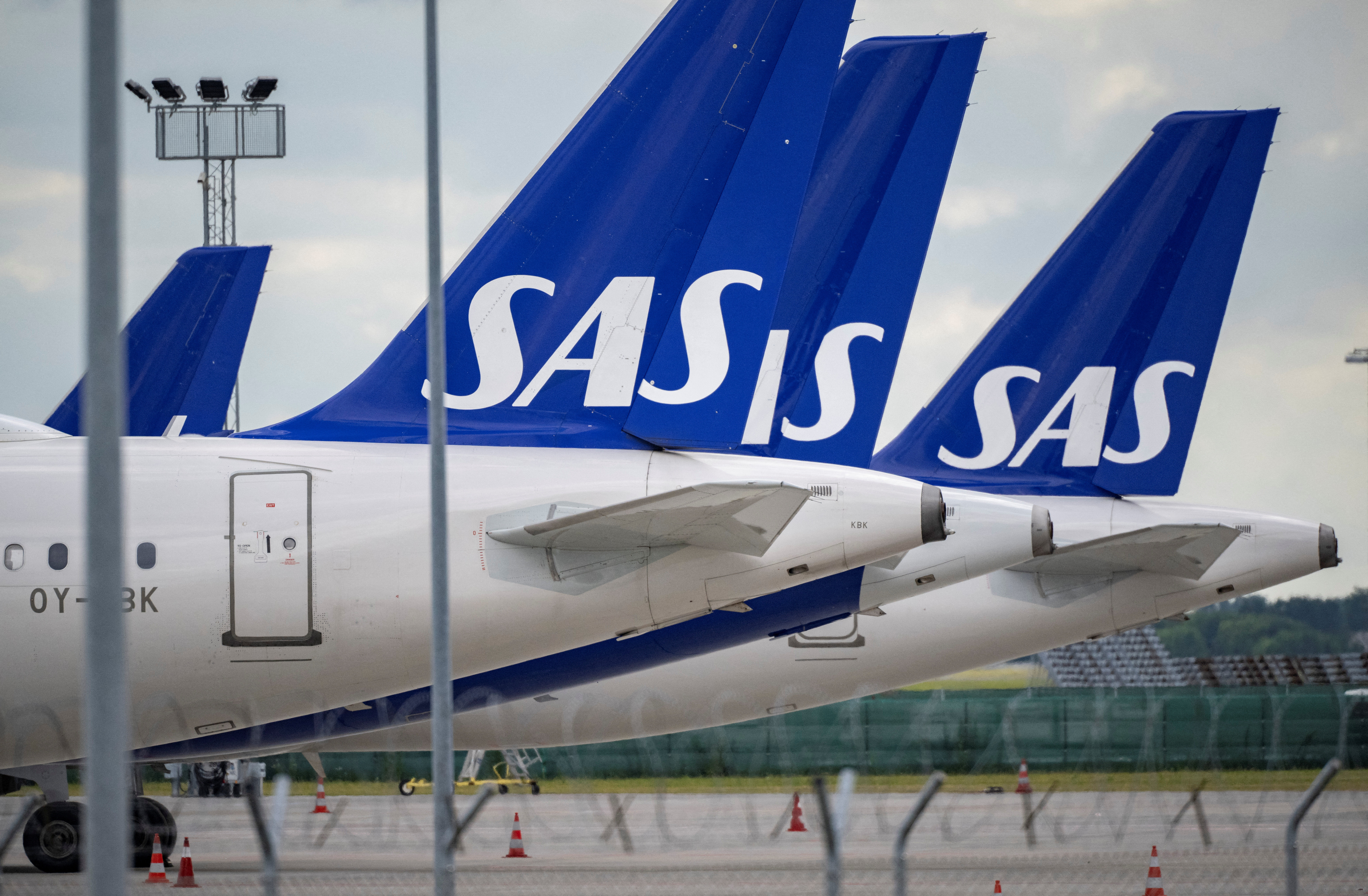 FILE PHOTO: View of SAS Airbus A321 and A320neo aircraft at Kastrup Airport parked on the tarmac, after pilots of Scandinavian Airlines went on strike, in Kastrup, Denmark July 4, 2022. TT News Agency/Johan Nilsson via REUTERS