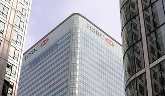 The logo of the HSBC bank is seen at its UK headquarters at Canary Wharf in London March 6, 2008. REUTERS/Toby Melville (BRITAIN)
