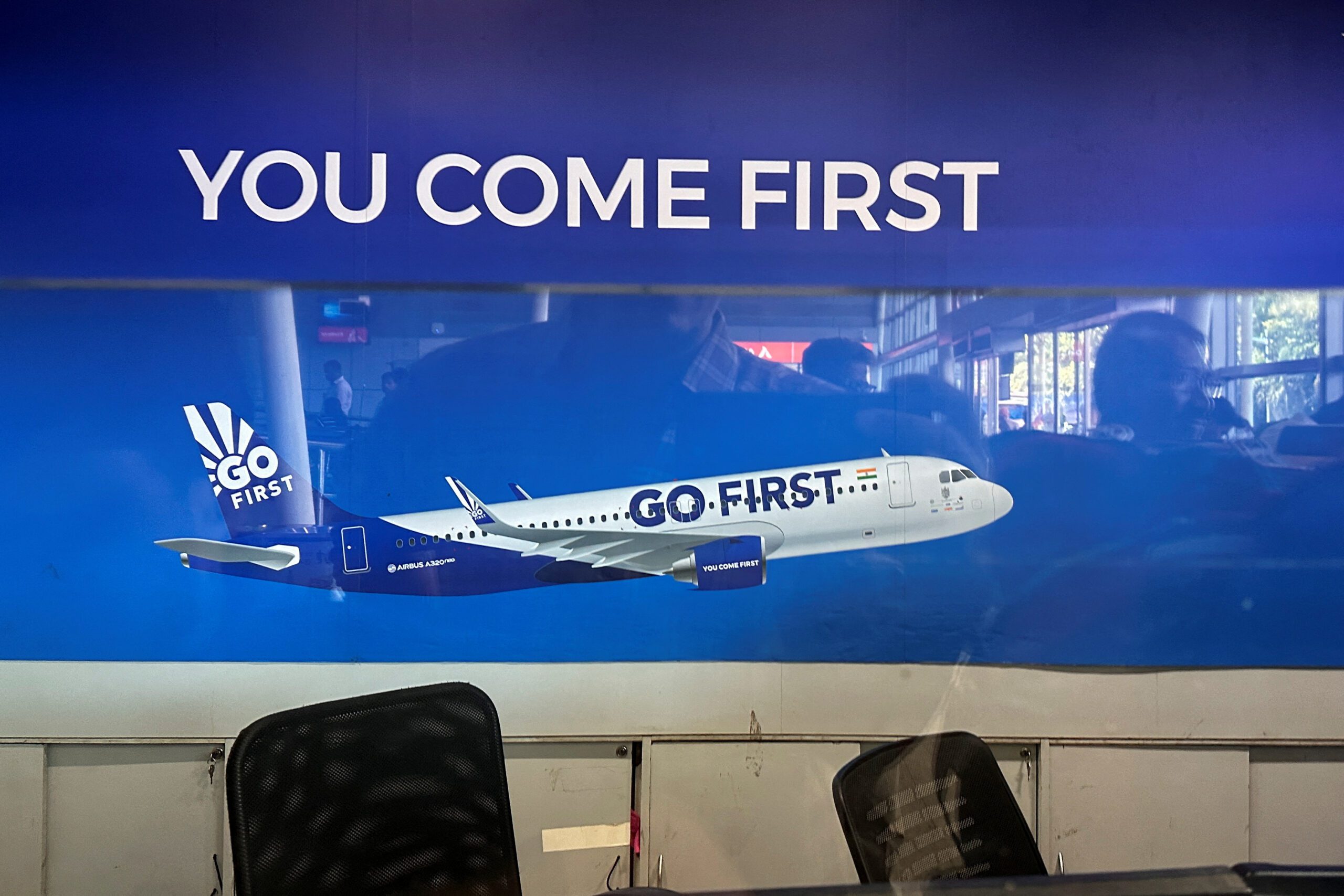 Empty seats are seen at a Go First ticketing counter at the Chhatrapati Shivaji International Airport in Mumbai, India, May 3, 2023. REUTERS/Francis Mascarenhas/File Photo