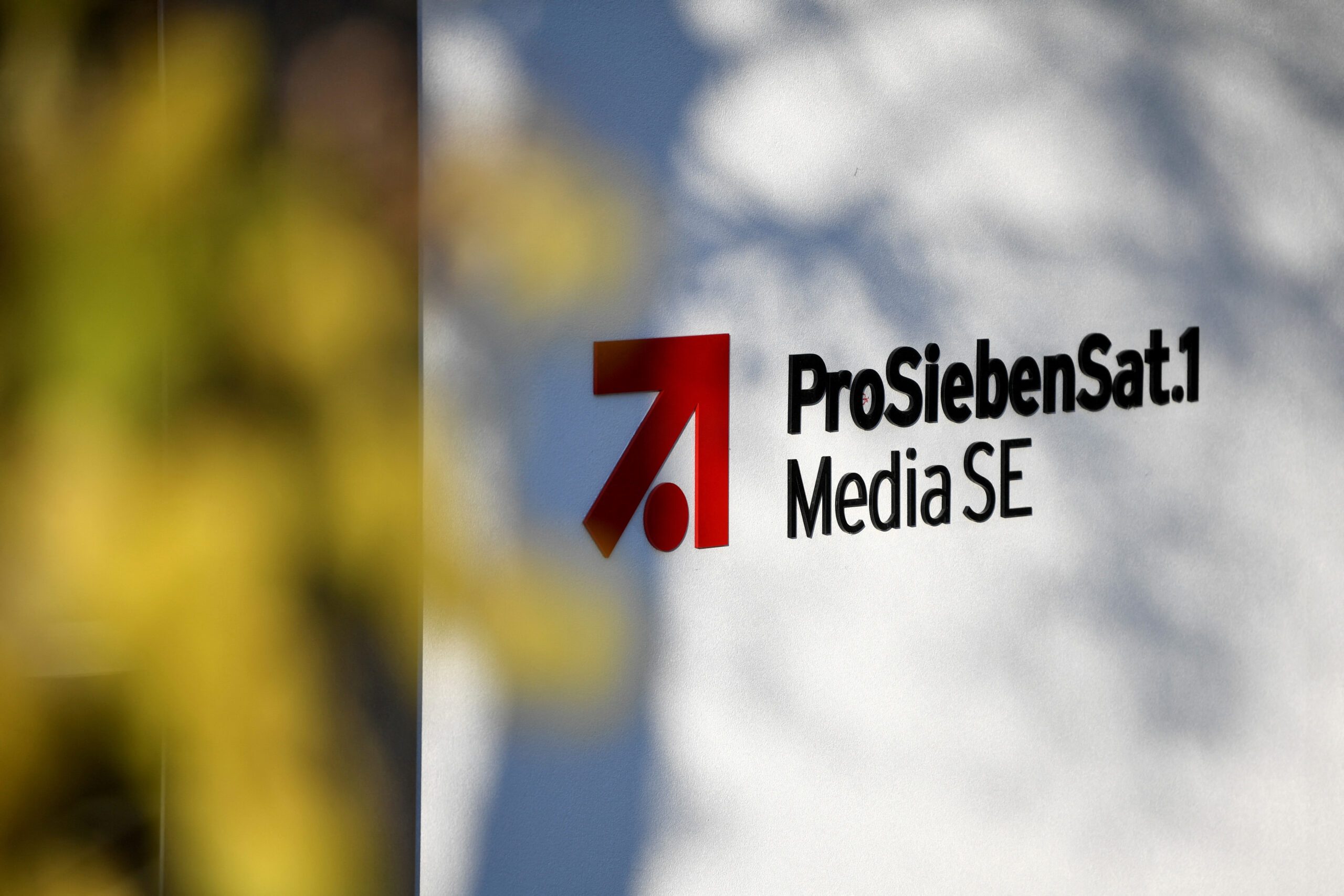 FILE PHOTO: The logo of German media company ProSiebenSat.1 is seen in front of the headquarters in Unterfoehring near Munich, Germany, November 5, 2020. REUTERS/Andreas Gebert/File Photo